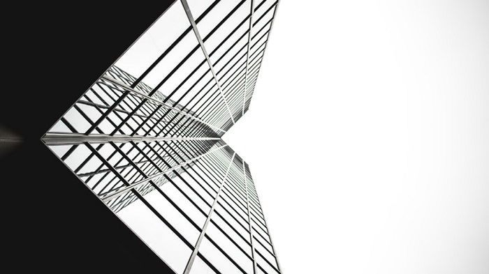 black and white film processing of a glass skyscraper