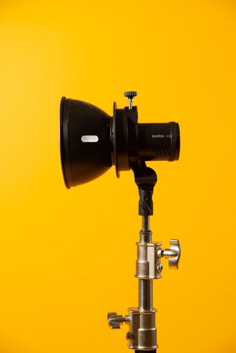 Standard reflector against a yellow background