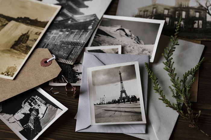 photographs on a wooden desk
