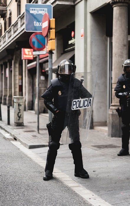 police officer in riot control gear