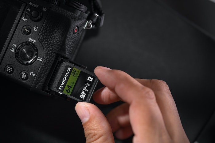 Inserting an SD card into a camera