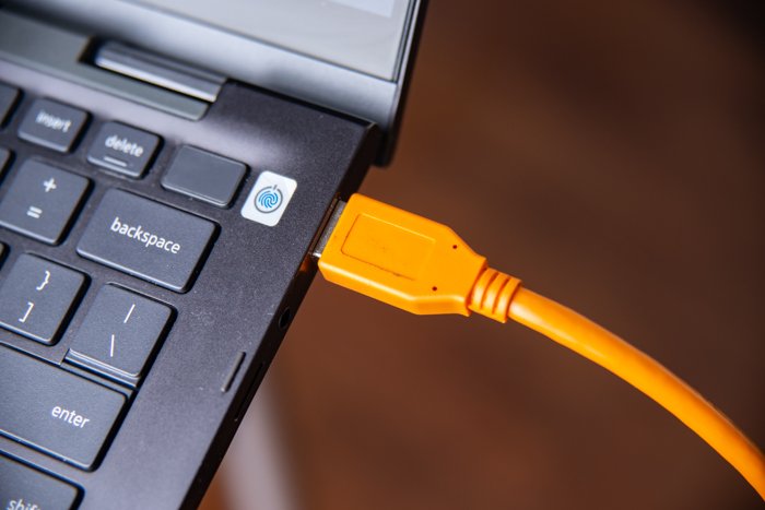 Closeup of a usb cable attached to a computer