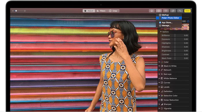 Screenshot of lightroom alternative Apple Photos software's interface with colorful portrait of a woman