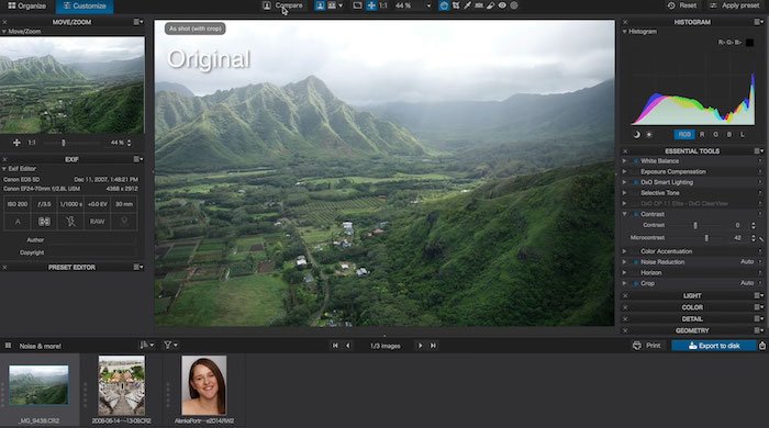 Screenshot of lightroom alternative DxO Photo Lab software's interface with a lush green landscape photo of a mountain valley