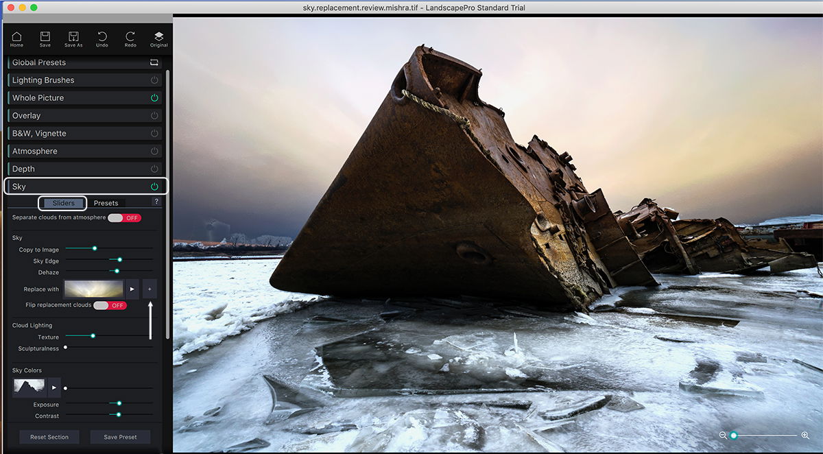 Rusted shipwreck on icy water with sky replaced using Landscape Pro