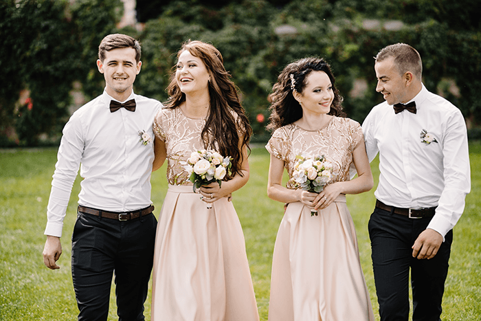 wedding photography: an image of two groomsmen with two bridesmaids 