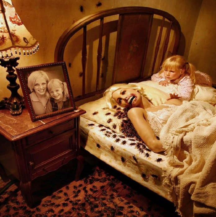 scary horror photography: a child lays on a bed next to her mother with cockroaches coming out of her mouth