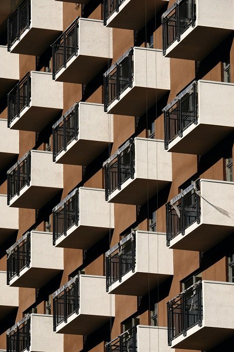 rhythm in photography: a series of apartment balconies create a repeating pattern