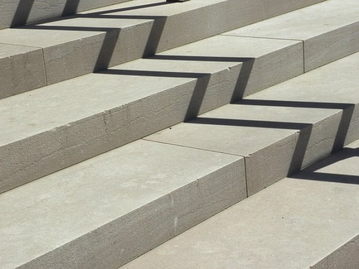 photo of stairs with interesting shadows creating a zig zag pattern