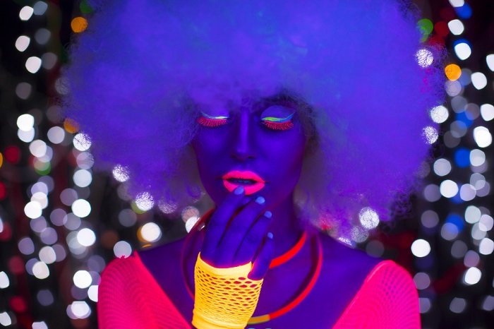 portrait black light photography using UV makeup and clothing