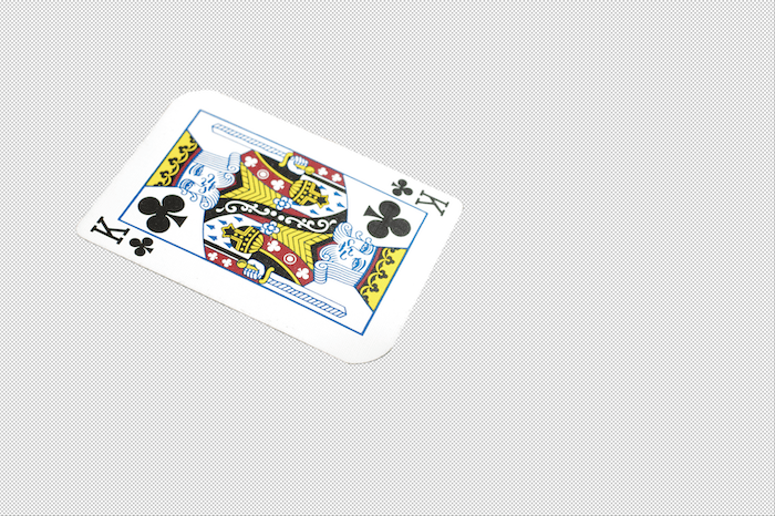 motion blur in photoshop: King of clubs playing card cut out from the background in Photoshop
