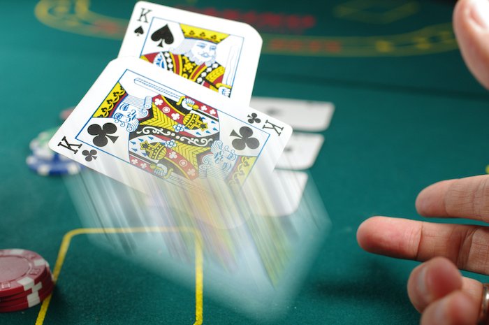 Motion blur added to an image of playing cards in Photoshop