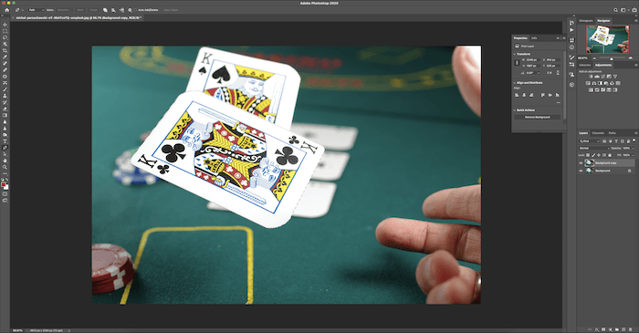 motion blur in photoshop: Photoshop screenshot with an image of playing cards being thrown on a table