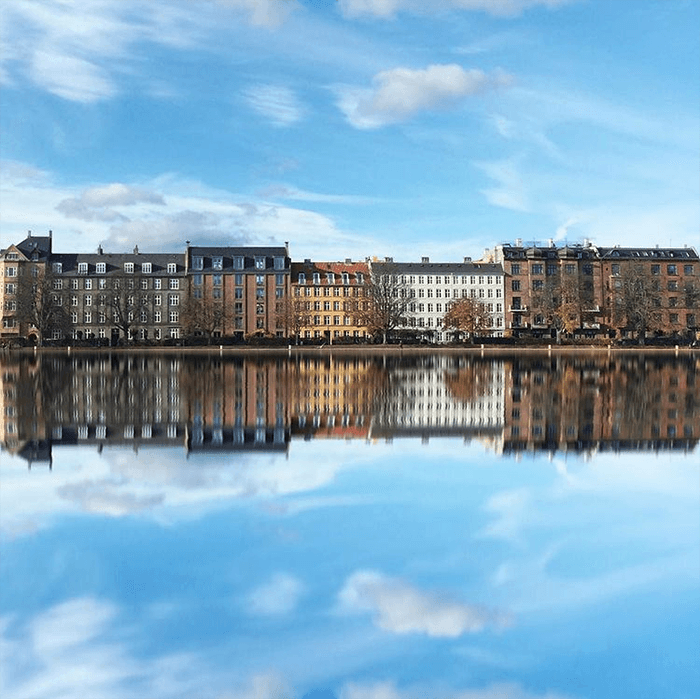 cityscape photography: Building, cloud, and blue sky reflections in Copenhagen Denmark 