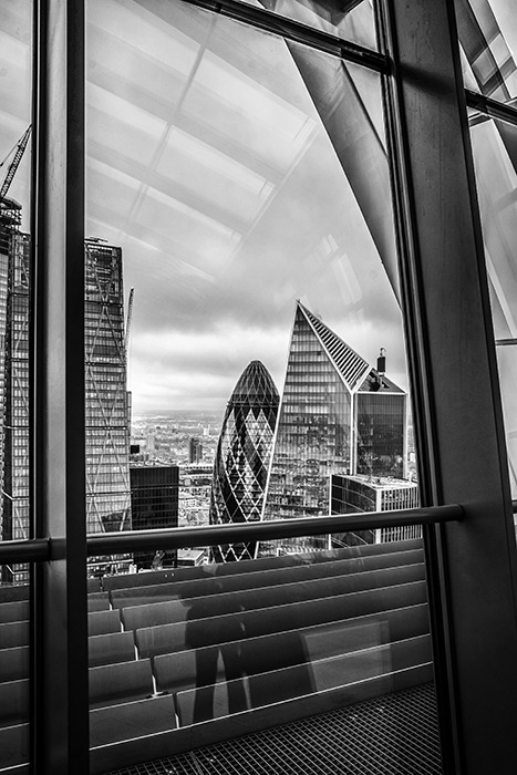 city photographed: The Gherkin building in London shot from indoors and framed by a window