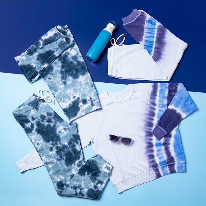Flat Lay Photography for Clothing: Flat lay shot of tie dye pants long sleeved shirts and accessories
