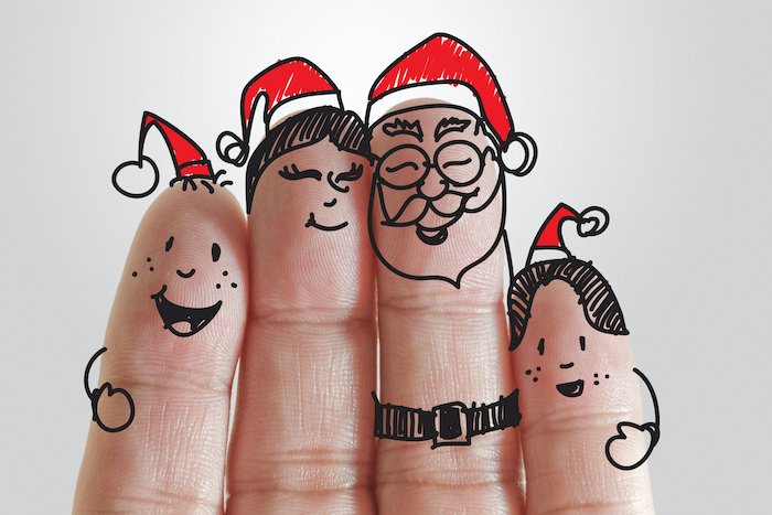 Fingers with faces and Santa hats for Christmas card photo ideas