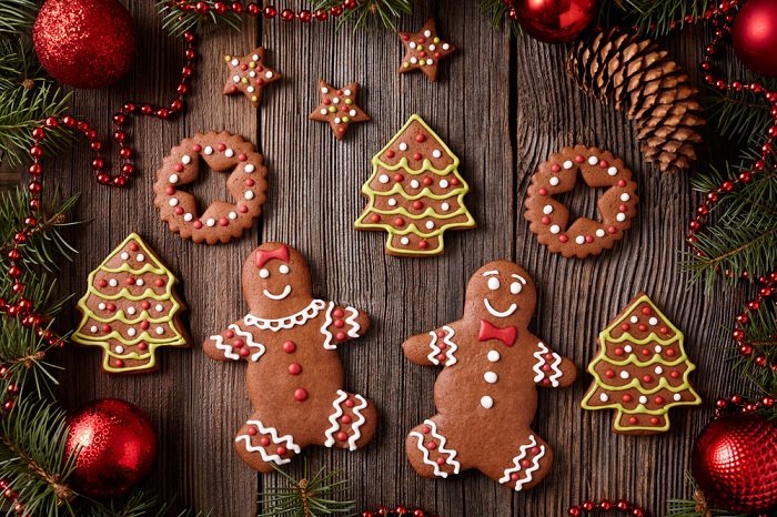 a flat lay photograph of two gingerbread people 