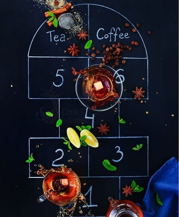 Creative tea and coffee display with a hopscotch drawn on a chalkboard used as a food photography prop