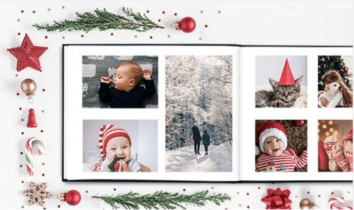 Christmas ornaments and a book of family pictures for photo gift ideas