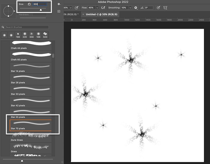 Screenshot of star brush strokes on a white background for a sparkle effect in Photoshop