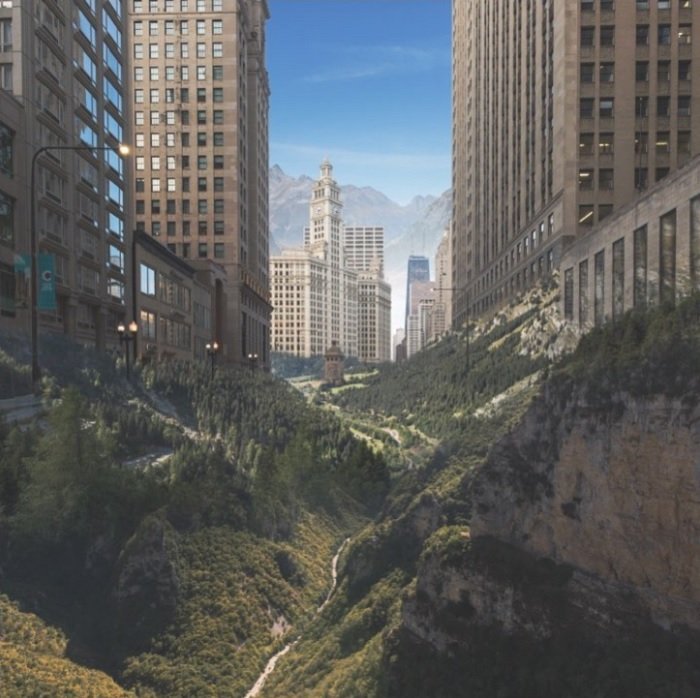A composite images of mountain terrain inside a cityscape