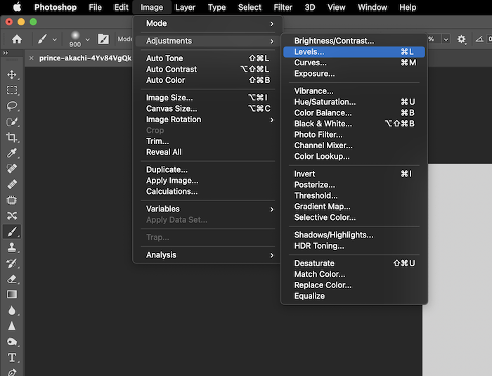 screenshot of selecting levels in the drop down menu in photoshop