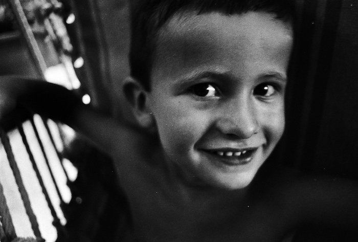 Grainy Image of a child in black and white 