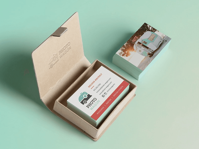 photography business card designs where there is a set inside a cardboard box and a set of business card outside