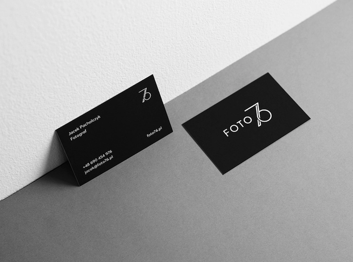 minimal design on a mostly black photography business card