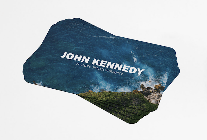 Photography business card designs where the sea takes up most of the business card 