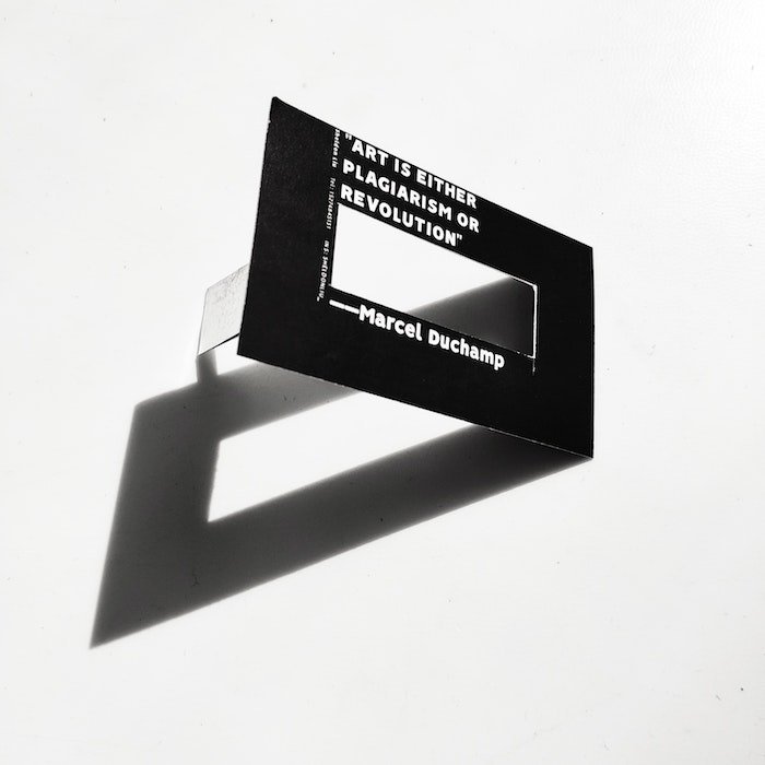 Art business cards. Fun design of a cut out in a business card that then looks like a picture frame