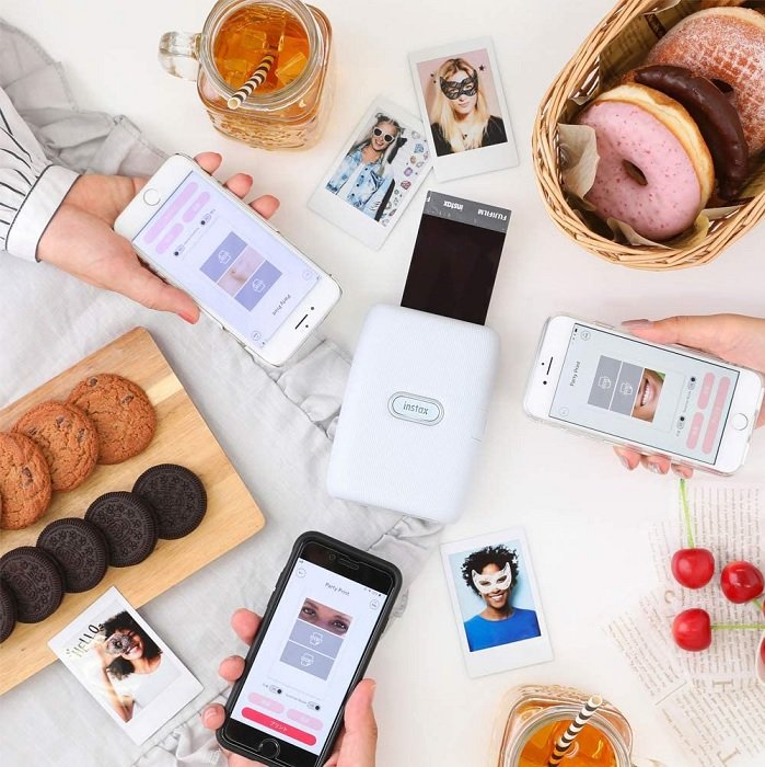 Flat lay photo of the Instax Printer, great for printing instagram photos