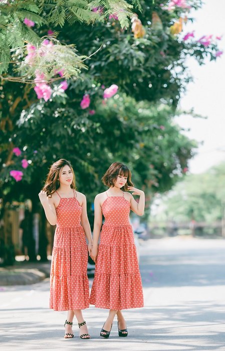 Two girls in matching dresses a sisters photoshoot idea