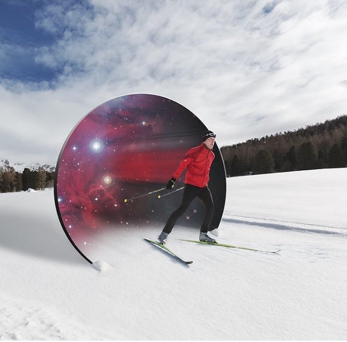 Surreal Photography example of a skier going through space portal