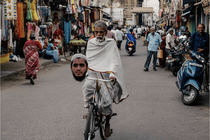 an image of a man on a bicycle and another man's head before face swap in photoshop