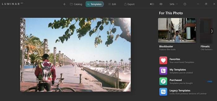 Luminar AI screenshot with photo of cyclist in front of a boardwalk