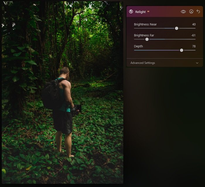 Man with camera in jungle after using relight AI in luminar neo