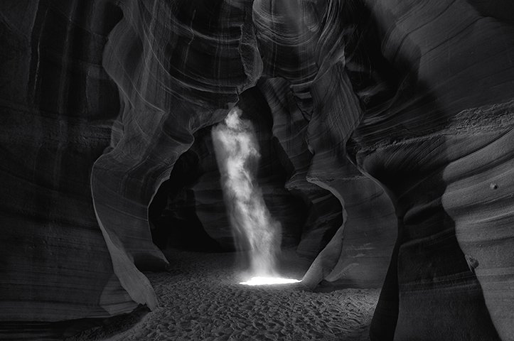 Black and White photo of dust cloud in cave