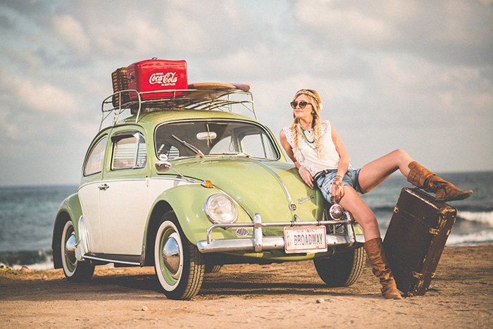 Original image or retro woman and a Volkswagen