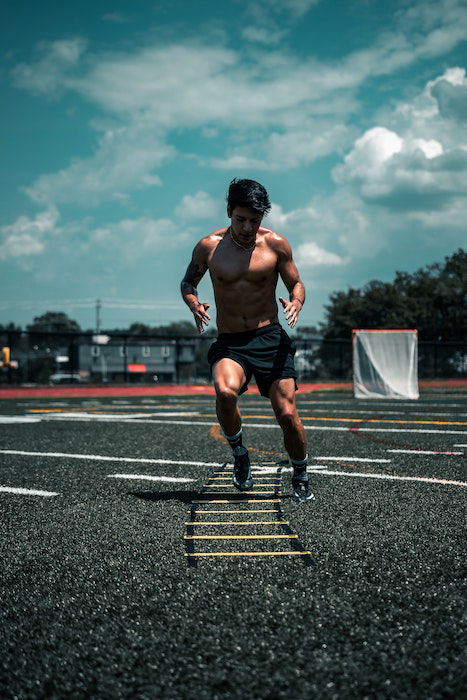 Athelete training outdoors as an idea for male poses