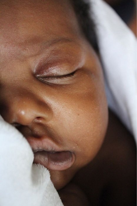 Close up of sleeping baby's face for a newborn photo idea