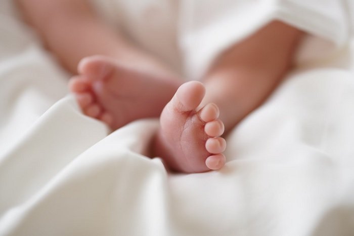 Close up of a baby's feet as a newborn photography idea
