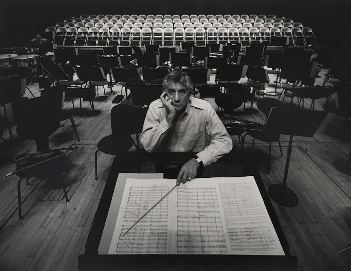 Portrait of Leonard Bernstein in a music studio