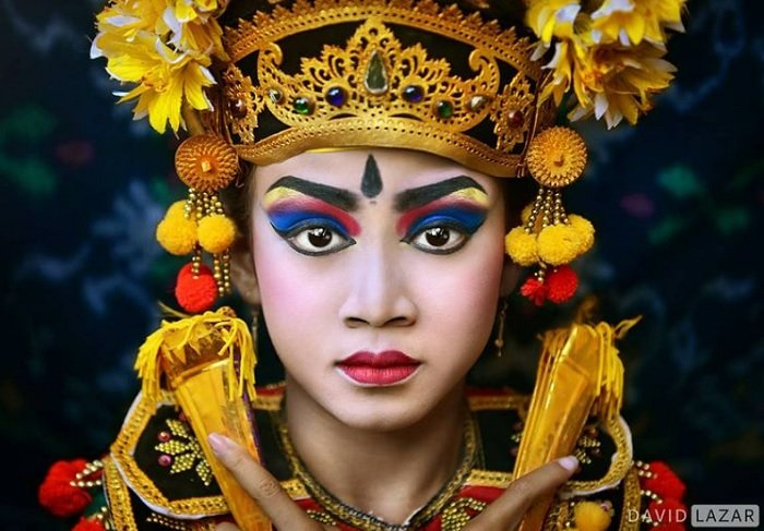 portrait of a balinese dancer in traditional clothes