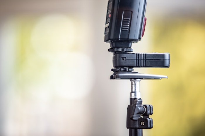 a camera flash set on a stand