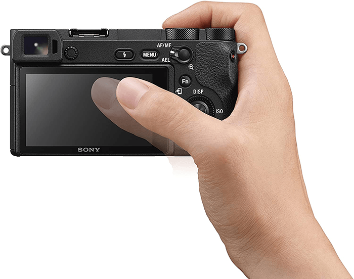 Sony A6500 being held