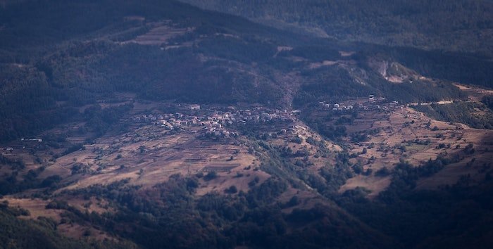 A miniature shot of a hillside village