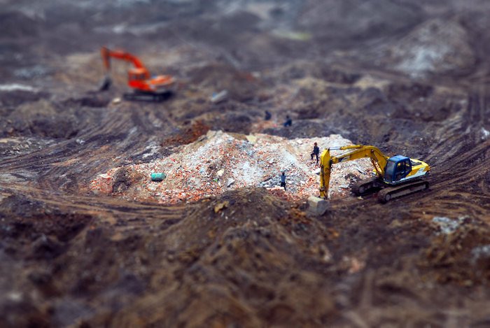 A tilt shift shot of a worksite made to look like a model