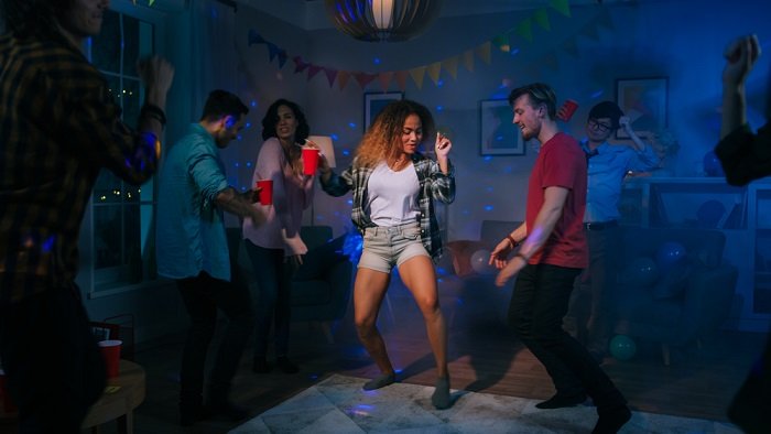 People dancing at a house party